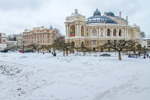 Historic building beside a snow-covered square in Odesa.