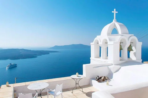 White chapel and blue sea in Santorini.